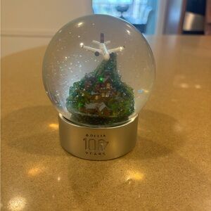Delta Festive Snow Globe with Airplane and Mountain